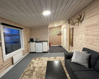 Camp Caroli Mini lodge - Kiruna - Living room