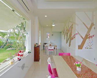 Jin Zhu Ya Homestay - Wujie Township - Comedor