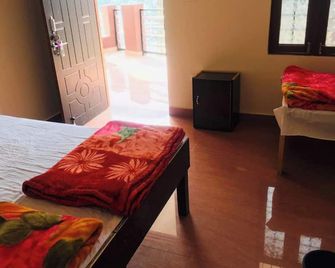 Valley View Goroomgo Hotel Amba Niwas Homestay Uttarkashi - Uttarkāshi - Habitación