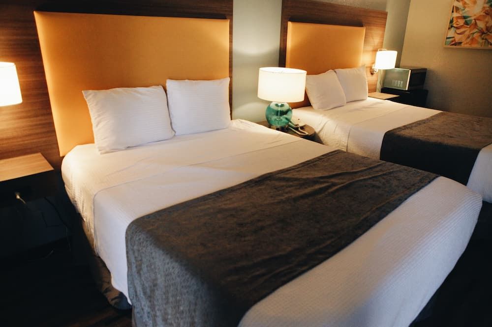 Budgetel Inn & Suites - ממפיס - חדר שינה