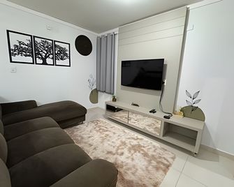 Edifício com Ótima localização e Conforto - Toledo - Sala de estar