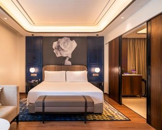 Radisson Blu Hotel Ahmedabad - Ahmedabad - Slaapkamer