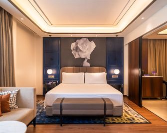 Radisson Blu Hotel Ahmedabad - אחמדאבאד - חדר שינה