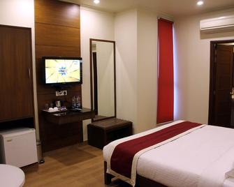 Hotel Dasaprakash - Agra - Schlafzimmer