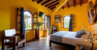 Hotel Suites La Hacienda - פוארטו אסקונדידו - חדר שינה