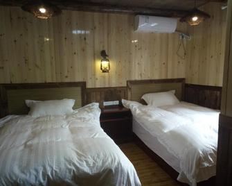 Wudangshan tianle hotel - Shiyan - Спальня