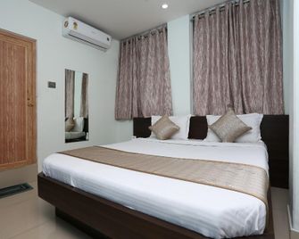 Super Hotel O Aashray Guest House - Guwahati - Bedroom