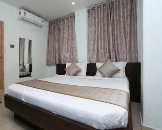 Hotel O Aashray Guest House - Guwahati - Bedroom