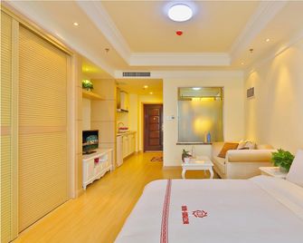 Liyuan international apartment (Qingdao Guoxin Exhibition Center store) - Qingdao - Bedroom