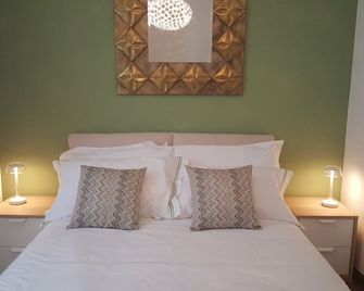 Madeleine apartments - Residenza Belle Époque - Milà - Habitació