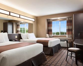 Microtel Inn & Suites by Wyndham Midland - מידלנד - חדר שינה