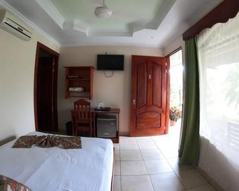 Hotel Sueñoreal Rioceleste - Katira - Bedroom