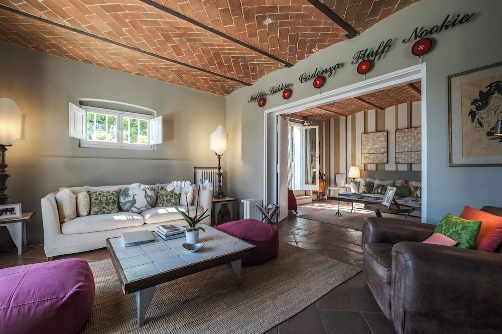 Fontelunga Hotel & Villas - Pozzo - Huiskamer