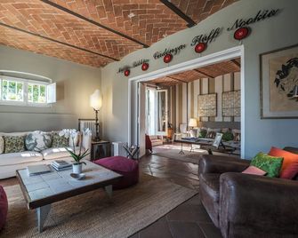 Fontelunga Hotel & Villas - Pozzo - Huiskamer