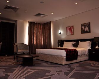 Golden Tulip Oniru Suites - Lagos - Habitación