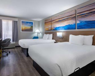 Days Inn & Suites by Wyndham Commerce - Commerce - Bedroom