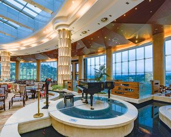 Country Garden Phoenix Suiet Hotel - Дайон - Ресторан