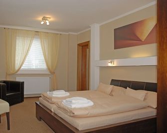Galileo - Žilina - Camera da letto