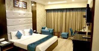 Hotel Shagun Chandigarh Zirakpur - Chandigarh - Habitación