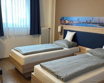 Hotel am Vogelsanger Weg - דיסלדורף - חדר שינה