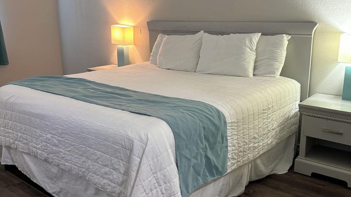 Deluxe 6 Inn & Suites