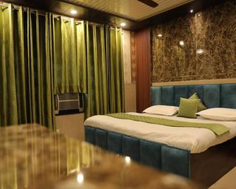 Hotel Green View - Jammu - Schlafzimmer