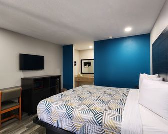 Scottish Inn & Suites - Wharton - Ložnice