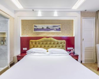 Jin Yuan Grand Hotel - שה-ג'יאג'וואנג - חדר שינה