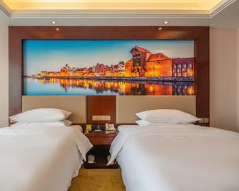 Vienna International Hotel Sichuan Leshan Giant Buddha - Leshan - Спальня