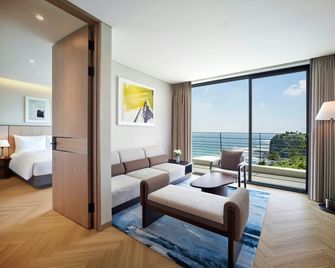 Parnas Hotel Jeju - Seogwipo - Huiskamer