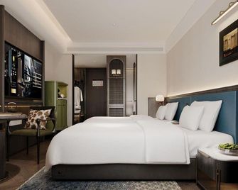 Mingyuan Holiday Hotel (Chongqing Jiefangbei) - צ'ונגקינג - חדר שינה