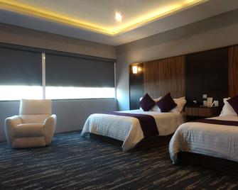 Wyndham Garden Aguascalientes Hotel and Casino - Aguascalientes - Bedroom
