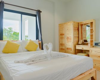 Phanomrung Hostel & Linn Chan Cafe - بوريرام - غرفة نوم