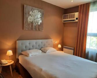 Logis Hôtel Restaurant Le Medicis - Блуа - Спальня