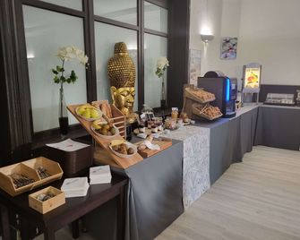 Brit Hotel Confort Auclair - Guéret - Buffet