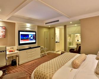 Zhong'an Huana Holiday Hotel - Hangzhou - Habitación
