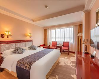 Dalian Intl Airport Hotel - דאליין - חדר שינה