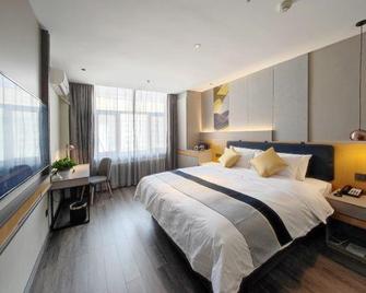 Home Inn (Jixi Jinlong Building Railway Station Wanda Plaza) - Jixi - Habitación