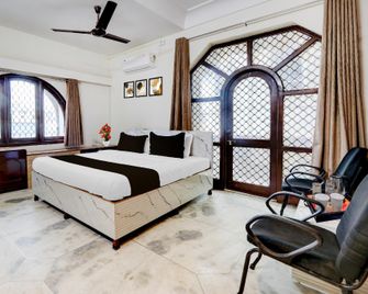 Hotel O Passport Office Nagpur Formerly Apex Stay Inn - Nagpur - Slaapkamer
