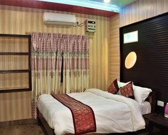 Sauraha Boutique Resort - Sauraha - Makuuhuone