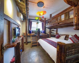 Hetianwan Inn - Zhangjiajie - Makuuhuone