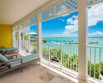 February Point Oceanfront Villa, New Owner Rates, Includes Free Day Boat Rental - Georgetown - Balcony