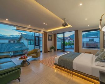 Gucheng district ying Xi ting Yu inn - ליז'יאנג - חדר שינה