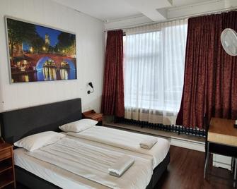 Hotel Holland Lodge - Utrecht - Bedroom