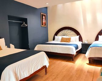 Hotel Jardines del Centro - סן קריסטובל דה לס קאסאס - חדר שינה