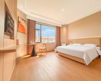 Wuning Hotel - Jiujiang - Schlafzimmer