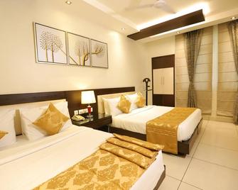 Hotel Amrapali Grand - New Delhi - Bedroom