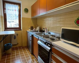 San Luigi - Rooms & Apartments - Campodolcino - Küche