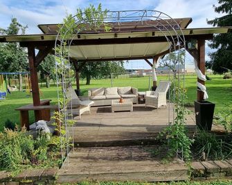 Non-smoking multi-bed room with shower and WC - Gästehaus Gravell - Rust - Patio