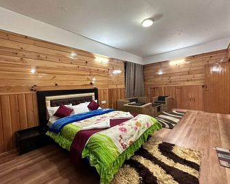 هوتل تاشي جيا-تسيل - Tawang - غرفة نوم